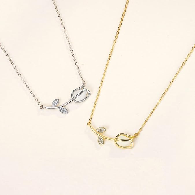 Elegant 925 sterling silver necklace with a delicate botanical pendant featuring a tiny plant motif and sparkling zircon accent.