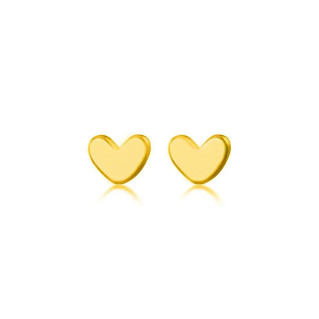 Delicate 925 sterling silver mini heart stud earrings with a chic, minimalist geometric design, perfect for everyday wear.