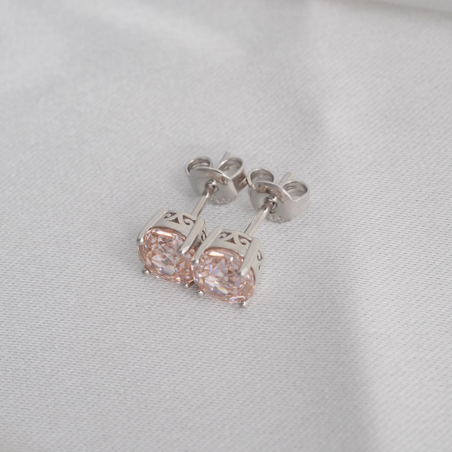 Delicate 1.5ct rose-cut octagon morganite pink stud earrings in white gold-plated sterling silver, sparkling with lab-created zircon accents.