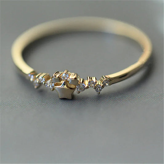 Delicate 925 sterling silver ring plated in 14K gold, featuring a sparkling zircon star design for a trendy, elegant look.