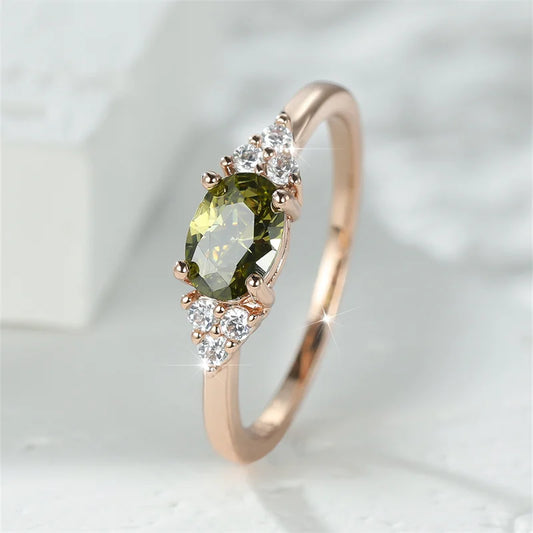 Elegant oval cubic zirconia ring with a prong-set, sparkling stone on a sleek, modern band, perfect for any occasion.