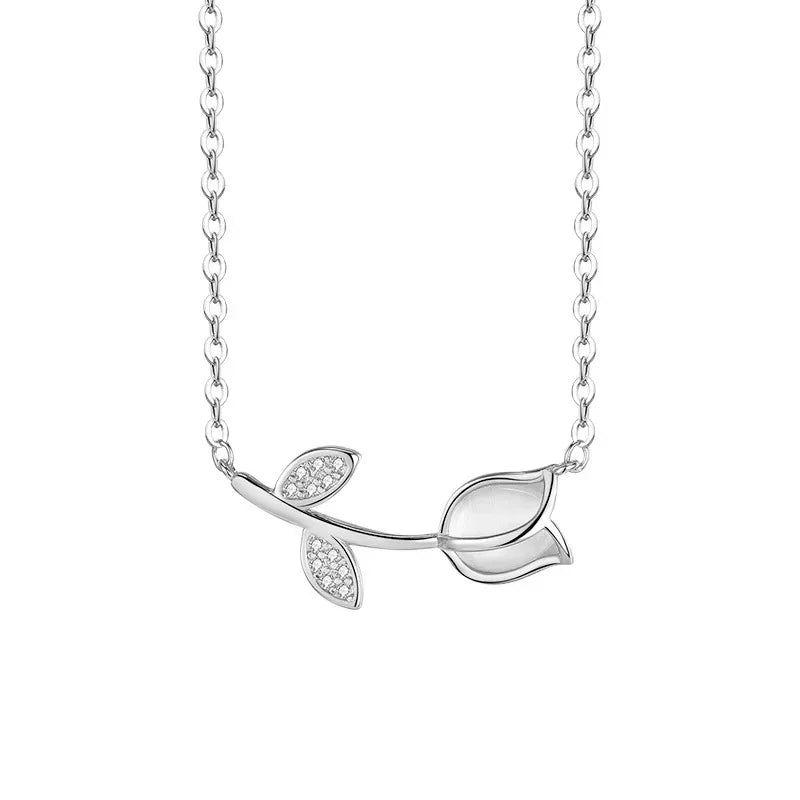 Elegant there, check out this stunning 925 sterling silver necklace featuring a delicate botanical pendant with a sparkling zircon accent.