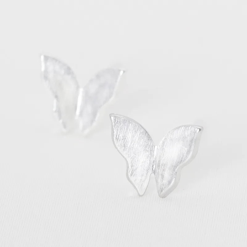 Delicate 925 Sterling Silver mini heart stud earrings with a chic, minimalist design, perfect for everyday elegance.
