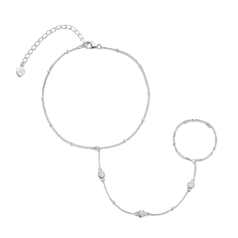 Elegant 925 sterling silver bracelet plated in 18K, featuring a dazzling round-cut Moissanite stone with a sleek design.