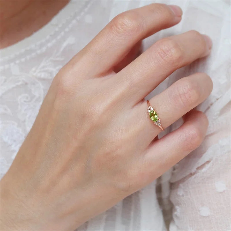 Stunning oval cubic zirconia fashion ring with a prong-set, sparkling stone on a sleek, modern, high-shine band.