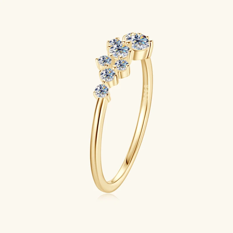 Stunning 14K gold-plated moissanite ring with a sparkling round brilliant center stone in a secure prong setting.