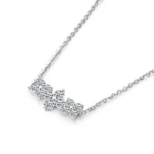 Delicate 925 sterling silver necklace with a sparkling moissanite four-leaf clover pendant, perfect for luck and love.