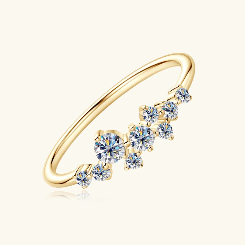 Dazzling 14K gold-plated moissanite ring with a brilliant round stone in a secure prong setting, perfect for special moments.