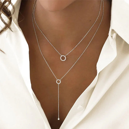 Elegant 925 sterling silver long O-chain necklace with a double-deck circle zircon pendant, sparkling with hand-cut detail.