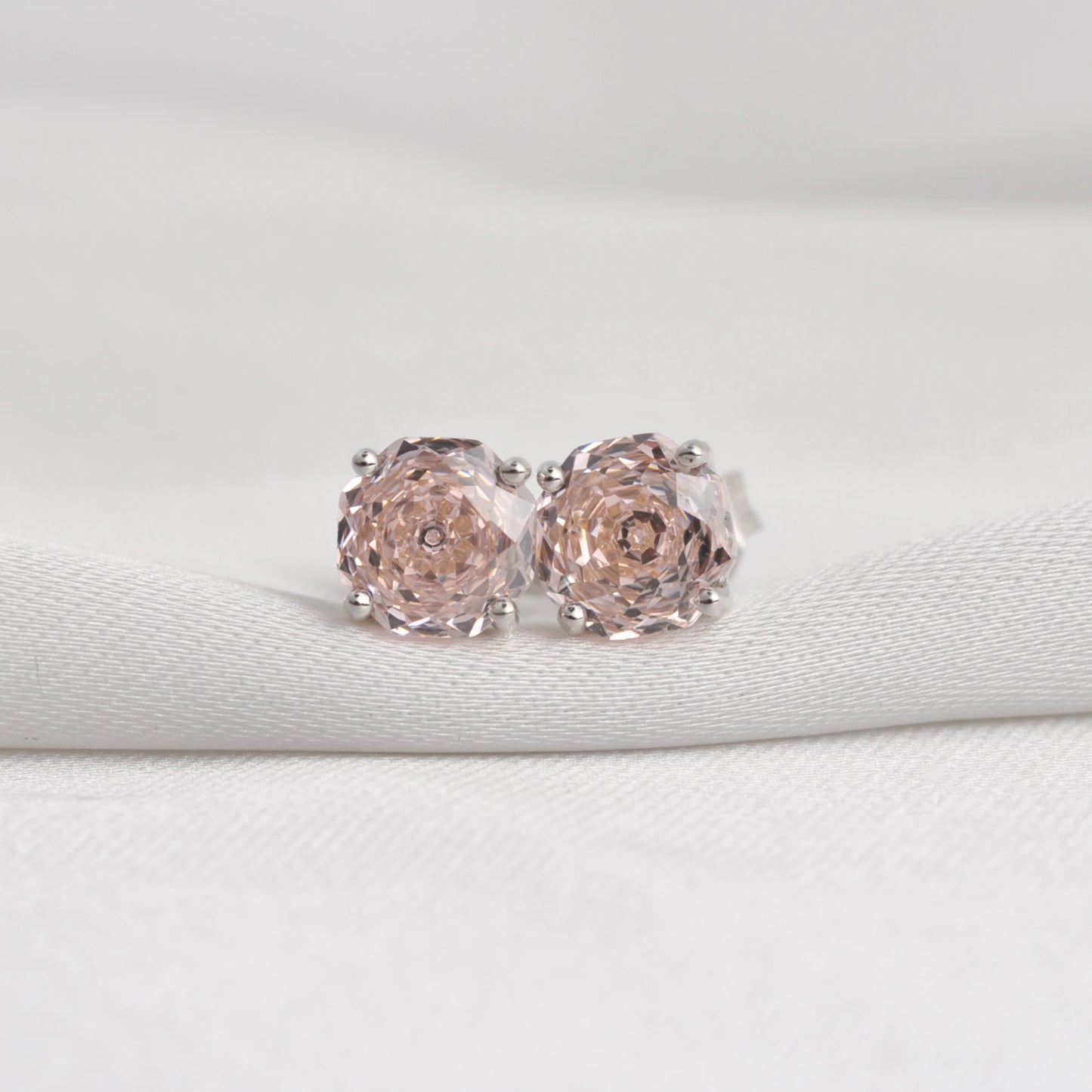 Delicate 1.5ct rose-cut octagon morganite pink stud earrings in white gold-plated sterling silver, sparkling with lab-created zircon accents.