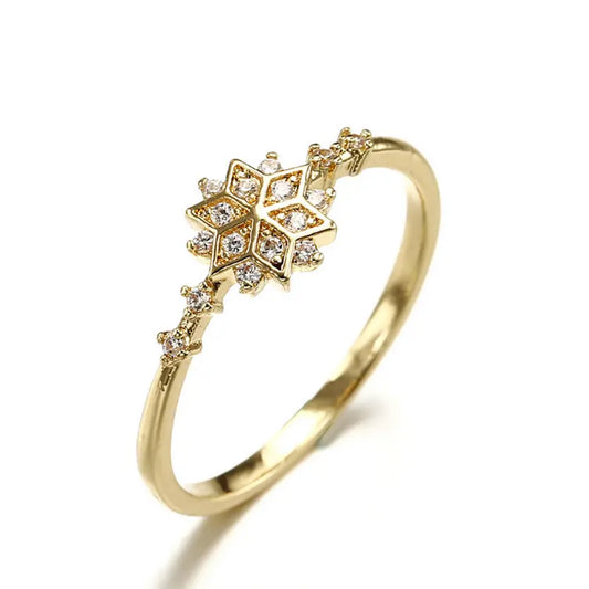 Delicate 925 sterling silver ring with 14k gold plating, featuring a romantic snowflake design and sparkling zircon center.