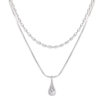 Elegant 925 sterling silver double-layer necklace with a delicate, handmade pendant, perfect for everyday or special moments.