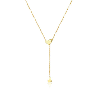 Delicate silver heart pendant necklace with a sparkling zircon center on a sleek 65cm snake chain, exuding elegant charm.