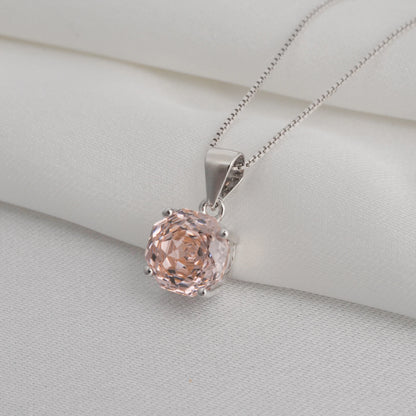 Stunning 2ct morganite pink octagon rose cut pendant necklace with an 8mm zircon, hanging on an 18-inch sterling silver rope chain.