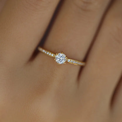 Elegant 925 sterling silver ring plated in 14K gold, featuring a sparkling 4mm zircon stone in a geometric 2mm band.