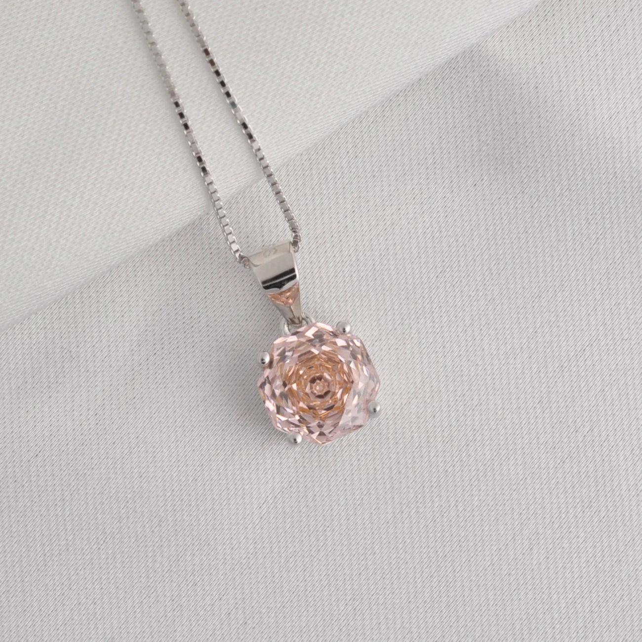 Delicate 2ct morganite pink octagon rose cut pendant necklace with an 8mm zircon, hanging on an 18-inch silver rope chain.