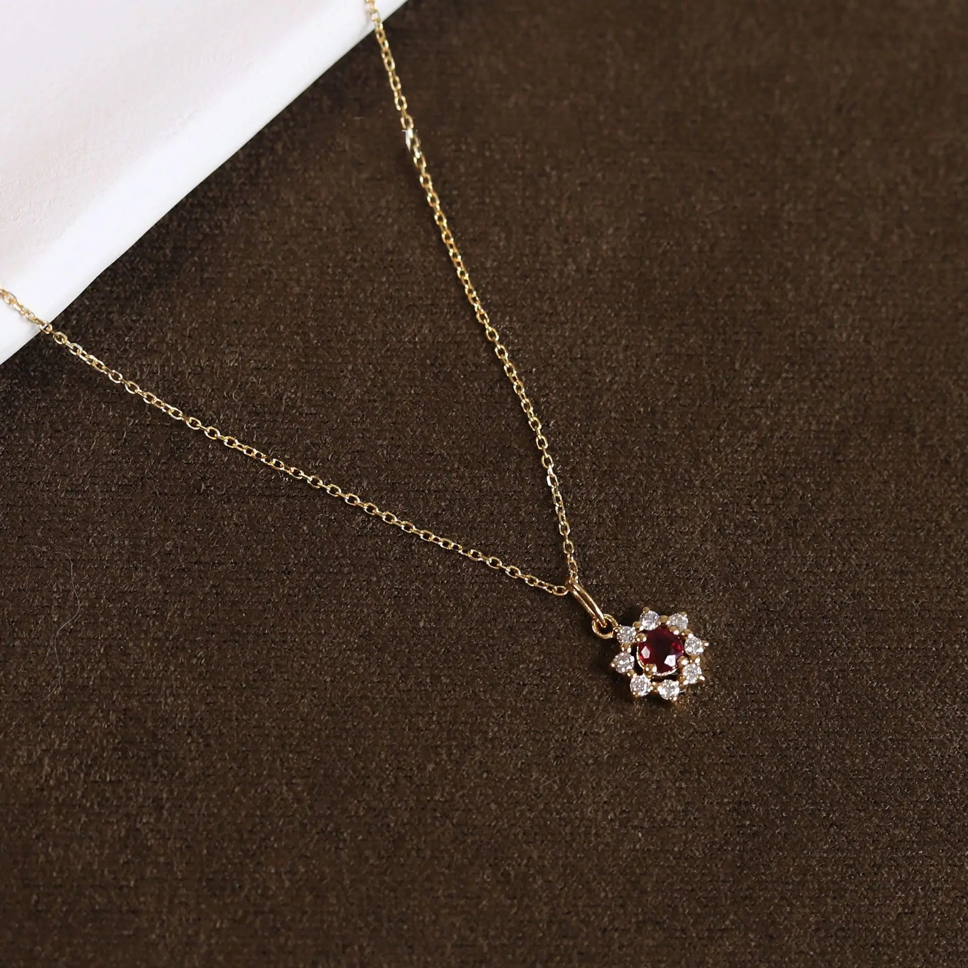 Gleaming 925 sterling silver necklace with a radiant sun pendant featuring a sparkling zircon centerpiece and gold-plated accents.