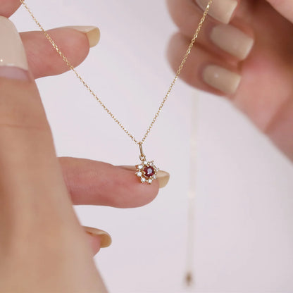 Gleaming 925 sterling silver necklace with a radiant sun pendant featuring a sparkling zircon center and gold-plated accents.