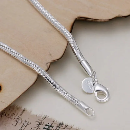 Elegant 925 sterling silver snake chain bracelet with a sleek 3mm round link design and secure lobster clasp.