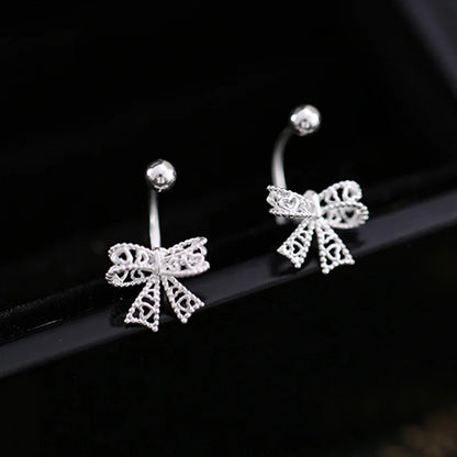 Charming 925 sterling silver bowknot stud earrings with a delicate, romantic design, perfect for any special occasion.