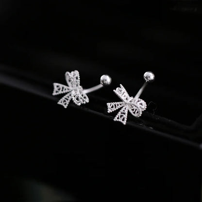 Delicate 925 sterling silver bowknot stud earrings with a cute, romantic design, perfect for any special occasion.