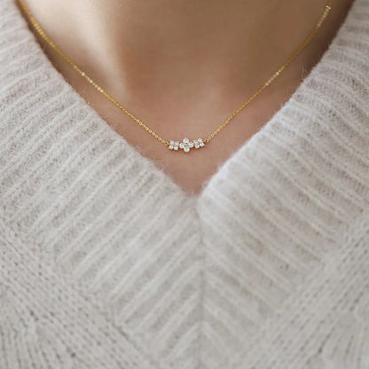 Delicate 925 sterling silver necklace featuring a sparkling moissanite four-leaf clover pendant for luck and elegance.