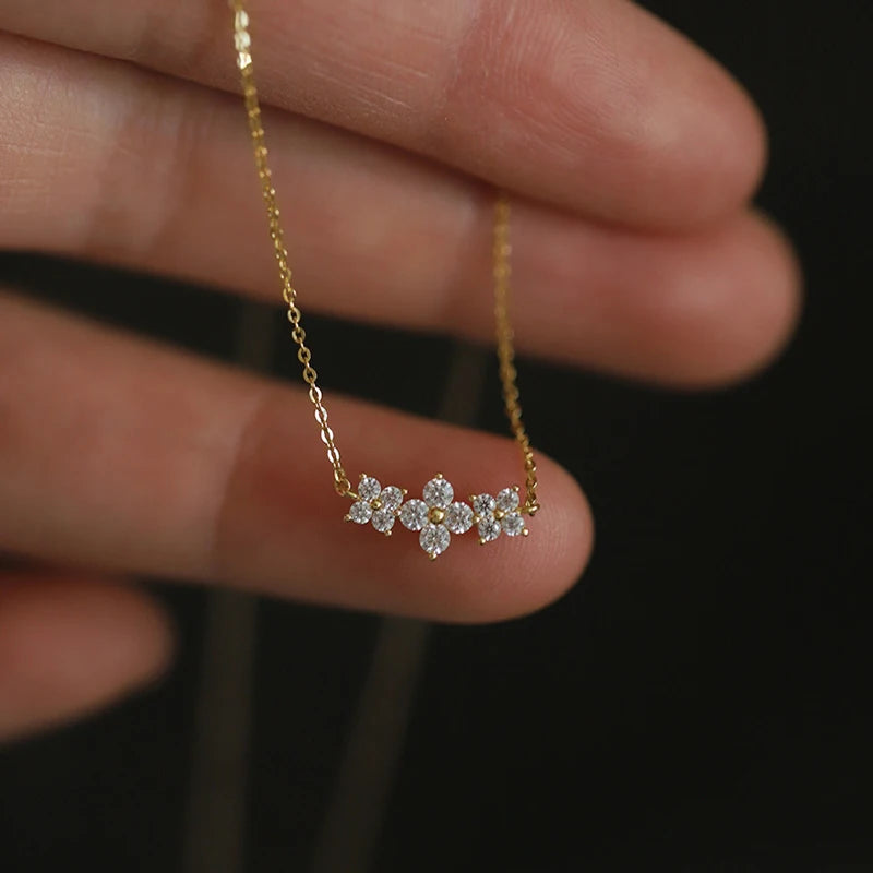 Delicate 925 sterling silver necklace featuring a sparkling moissanite four-leaf clover pendant for luck and elegance.