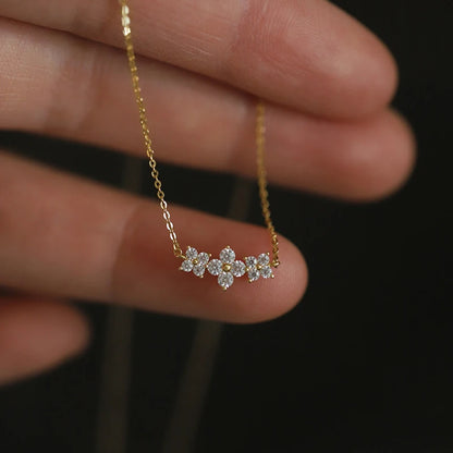 Delicate 925 sterling silver necklace featuring a sparkling moissanite four-leaf clover pendant for luck and elegance.