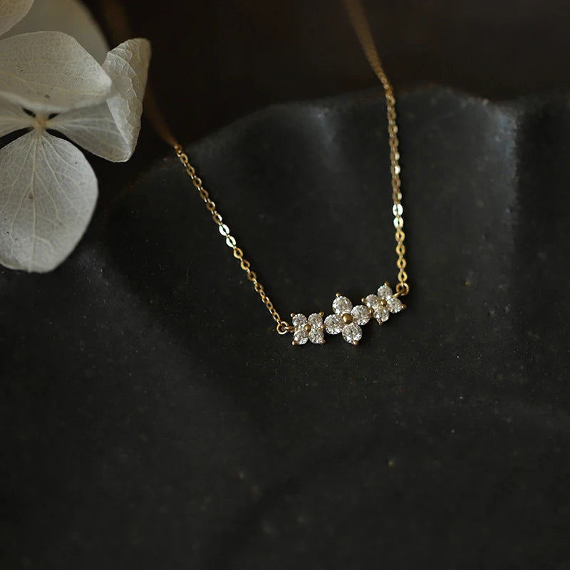 Delicate 925 sterling silver necklace featuring a sparkling moissanite four-leaf clover pendant for luck and elegance.
