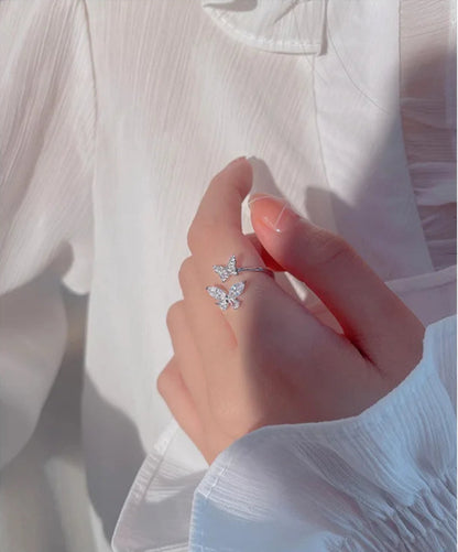 Delicate 925 sterling silver butterfly ring with sparkling zircon accents, showcasing intricate animal motif design.