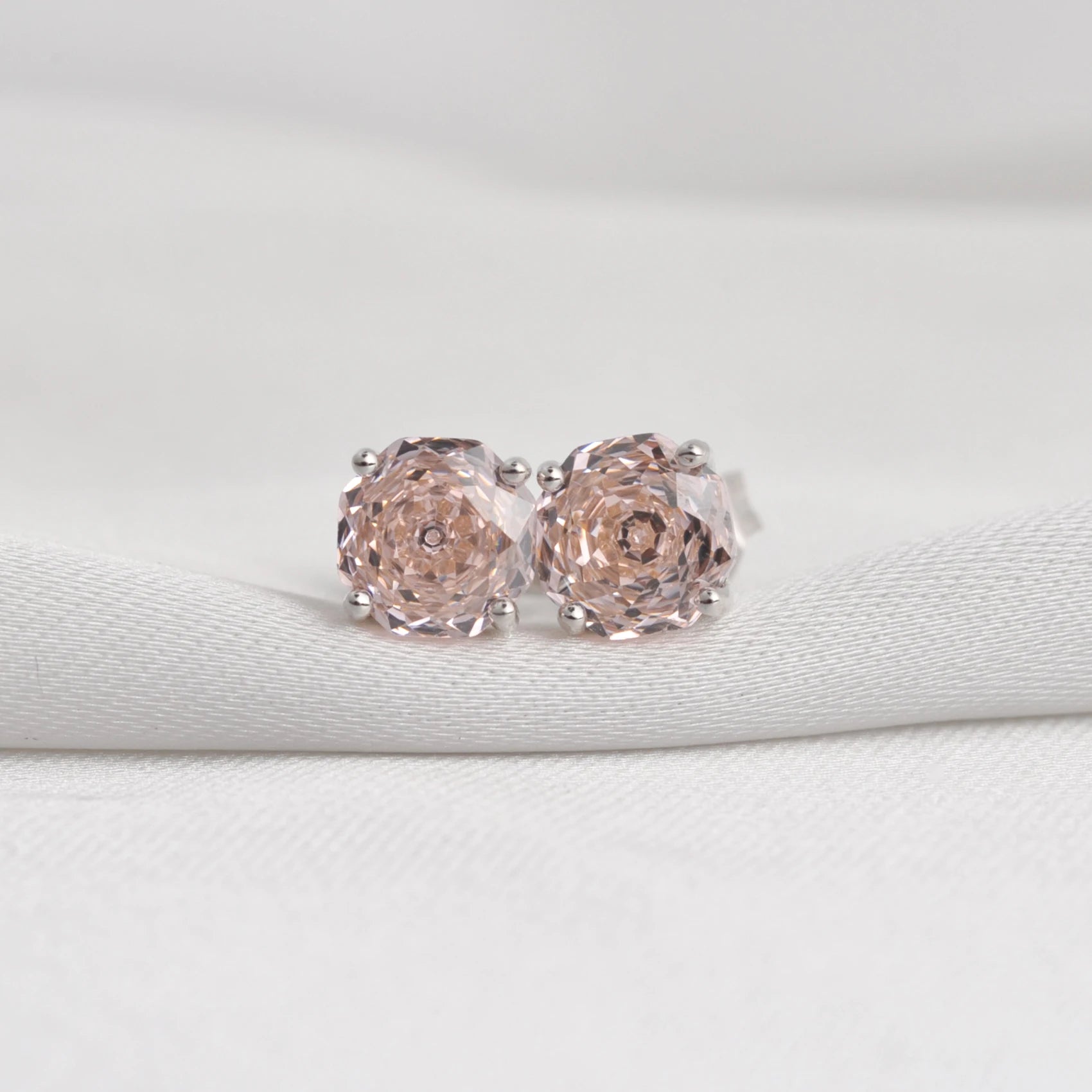 Delicate 1.5ct rose-cut octagon morganite pink stud earrings in white gold-plated sterling silver, sparkling with lab-created zircon accents.