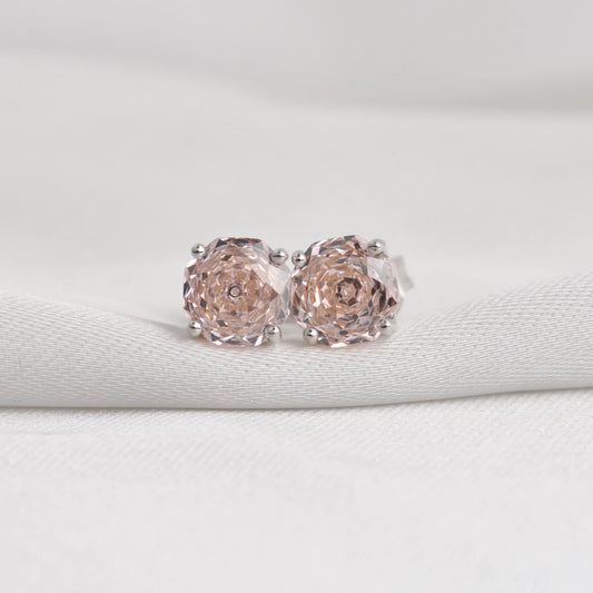 Delicate 1.5ct rose-cut octagon morganite pink stud earrings in white gold-plated sterling silver, sparkling with lab-created zircon accents.