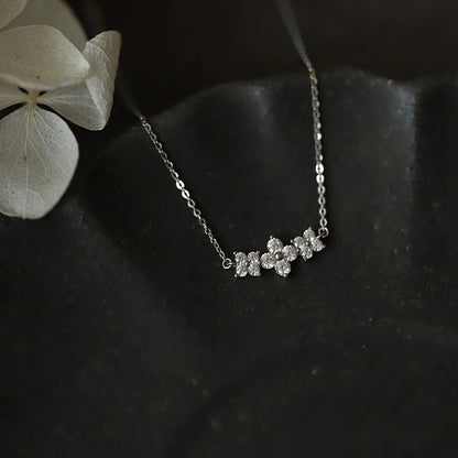 Delicate 925 sterling silver necklace with a sparkling moissanite four-leaf clover pendant, perfect for everyday luck.