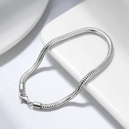 Gleaming 925 sterling silver snake chain bracelet with a sleek 3mm round link design and secure lobster clasp.