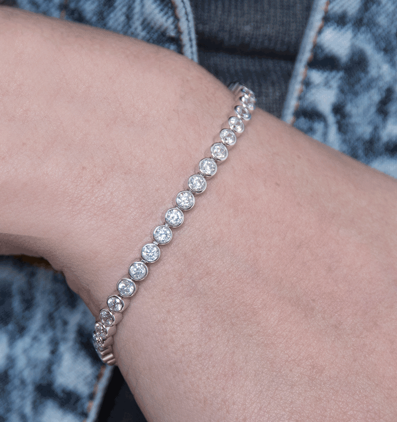 Sparkling full moissanite tennis bracelet in S925 silver with 18K plating, showcasing dazzling bubble diamond stones.