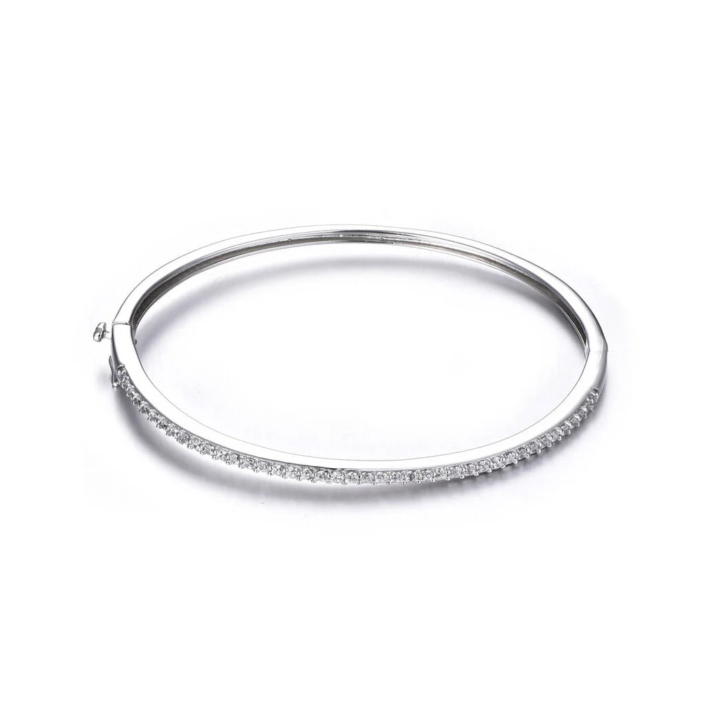 Elegant gold-filled sterling silver bangle with a sparkling zircon stone centerpiece, showcasing a minimalist 6cm round design.