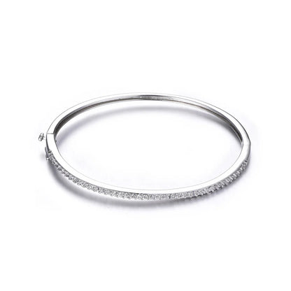 Elegant gold-filled sterling silver bangle with a sparkling zircon stone centerpiece, showcasing a minimalist 6cm round design.